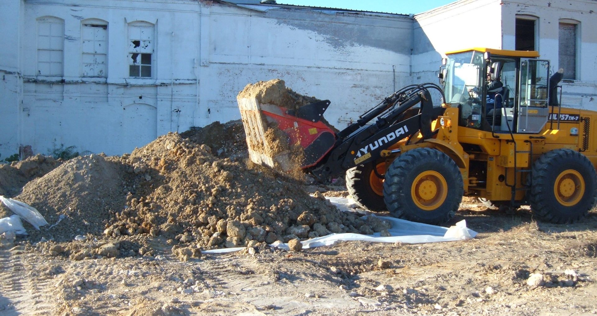 bucket truck mixing soil